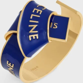 Celine Ribbon Knotted Cuff in Enamel and Brass with Gold Finish