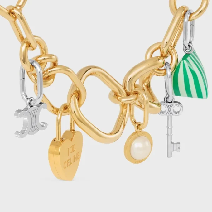 Charms Triomphe in Brass with Rhodium Finish Charms Triomphe in Brass with Rhodium Finish
