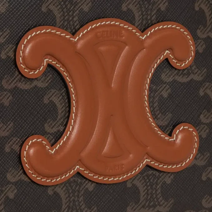 Half Moon Case in Triomphe Canvas and Calfskin Half Moon Case in Triomphe Canvas and Calfskin