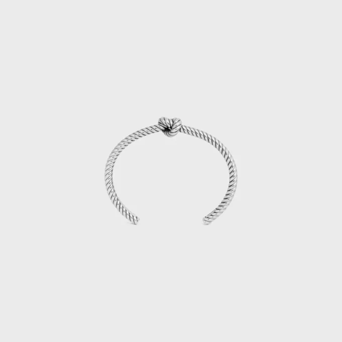 Knot Cord Patterned Cuff in Brass with Rhodium Finish Knot Cord Patterned Cuff in Brass with Rhodium Finish