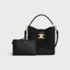 Medium Louise Bucket in Raffia and Calfskin Medium Louise Bucket in Raffia and Calfskin