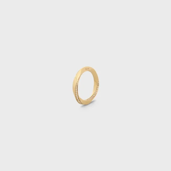 Torsion Ring in Yellow Gold and Diamonds Torsion Ring in Yellow Gold and Diamonds