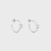 Triomphe Asymmetric Hoops in Brass with Rhodium Finish Triomphe Asymmetric Hoops in Brass with Rhodium Finish